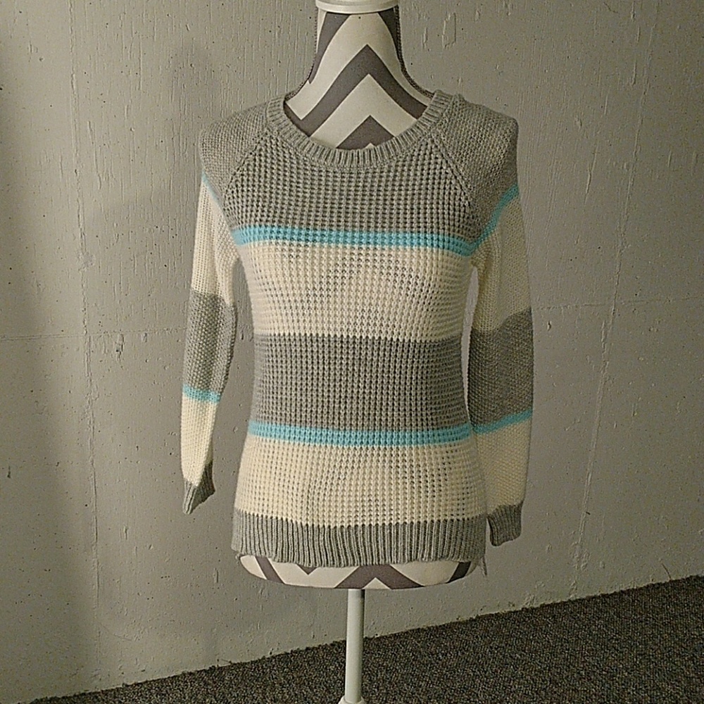 Striped knit sweater.